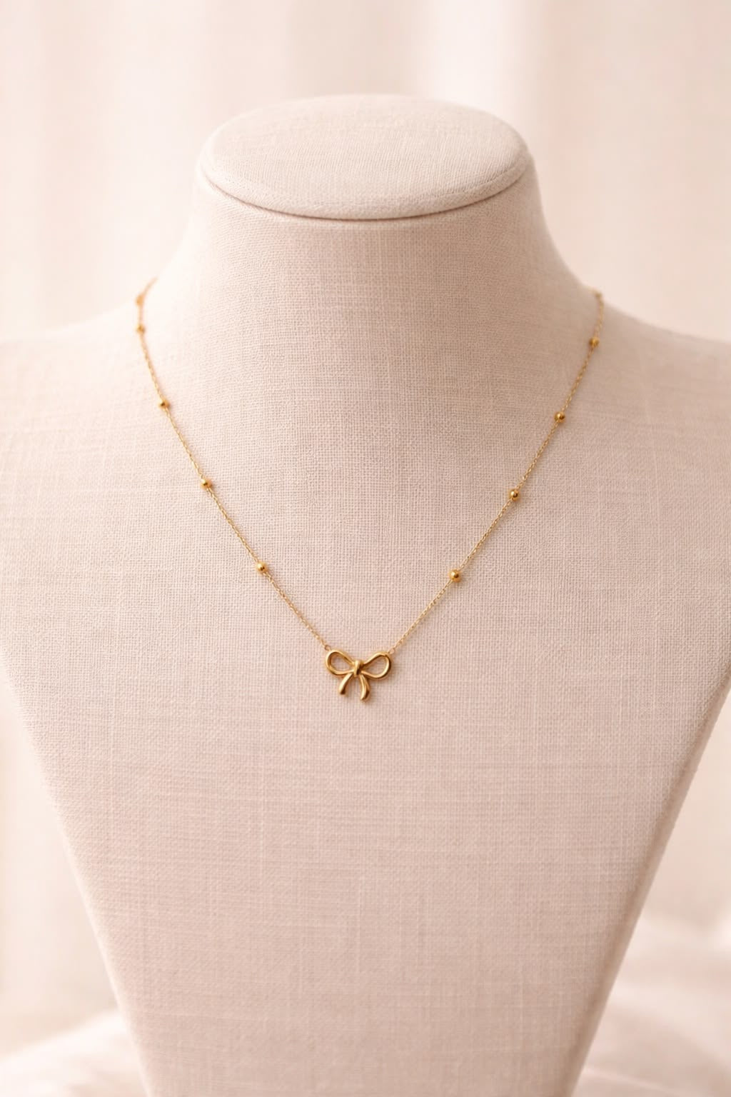 Stainless steel high quality minimal golden bow pendant