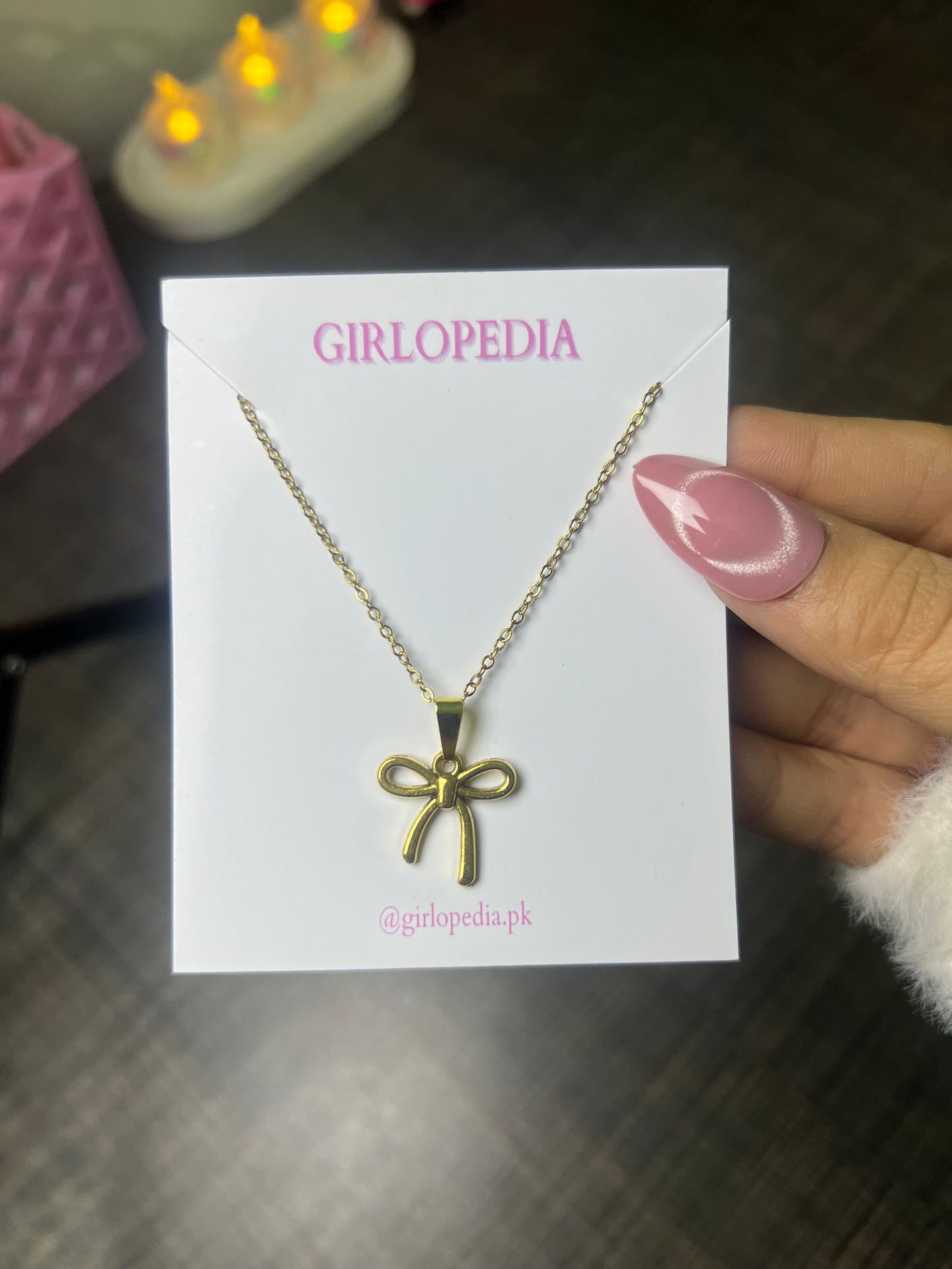 Stainless bow pendant chain