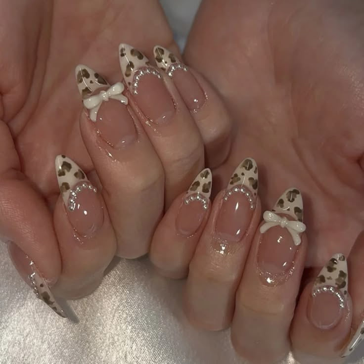 24pcs Nude 3d printed bow high quality premium Press On Nails | Reusable Fake Nails with Free Nail Tabs Stickers | Glossy Artificial Full Cover Nail Set for Women & Girls