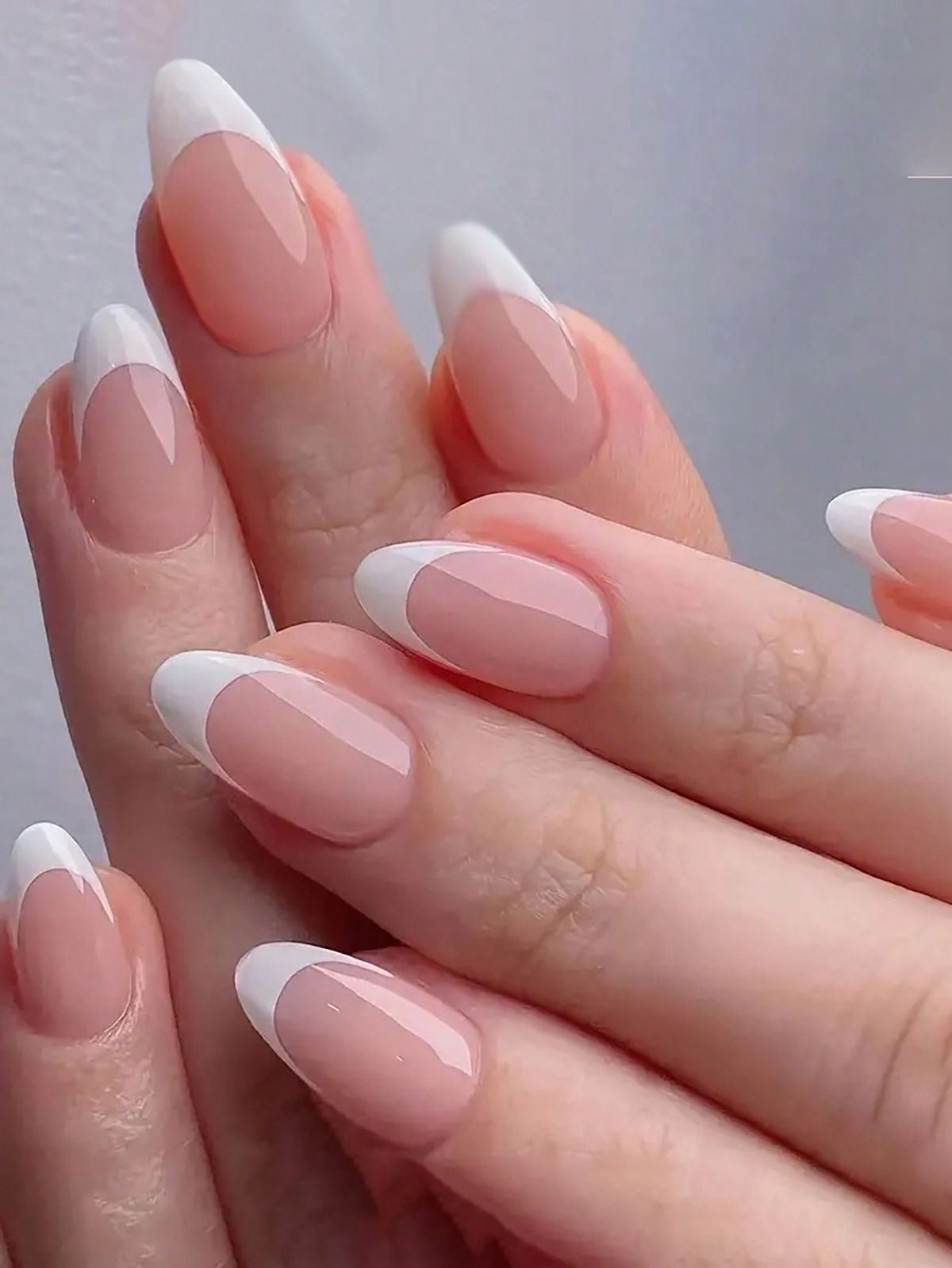 24pcs Hyper Realistic Classic White French Tip Almond Press-On Nails | Glossy Nude Full Cover Fake Nails | Reusable Salon Quality Nail Set | 24 PCS with Nail Tabs